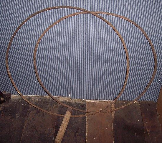 Appraisal: Two Victorian wrought iron hoops one with handle cm wide