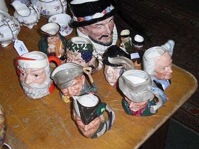 Appraisal: A COLLECTION OF TOBY JUGS to include Royal Doulton 'Gone