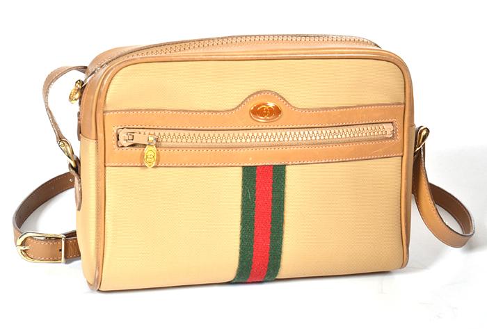 Appraisal: A VINTAGE HANDBAG BY GUCCI