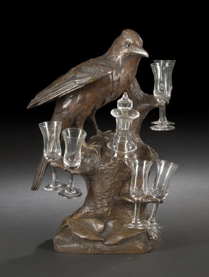 Appraisal: Schwarzwald Elaborately Carved Lindenwood Liqueur Stand fourth quarter th century