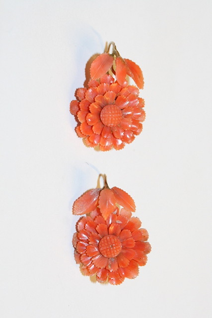 Appraisal: A PAIR OF VICTORIAN CARVED CORAL EARRINGS in the form