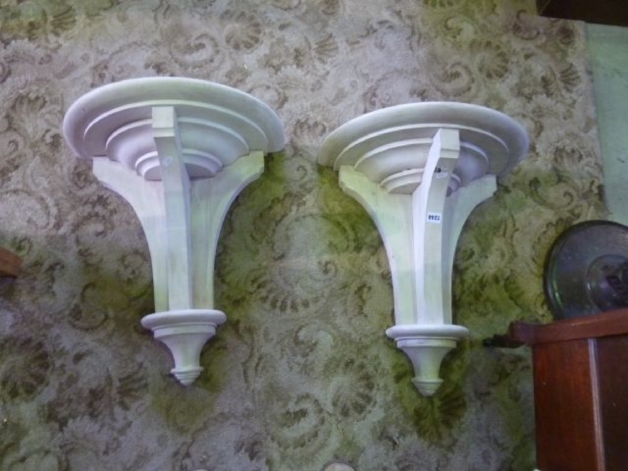 Appraisal: A pair of Victorian style gothic design wall brackets with