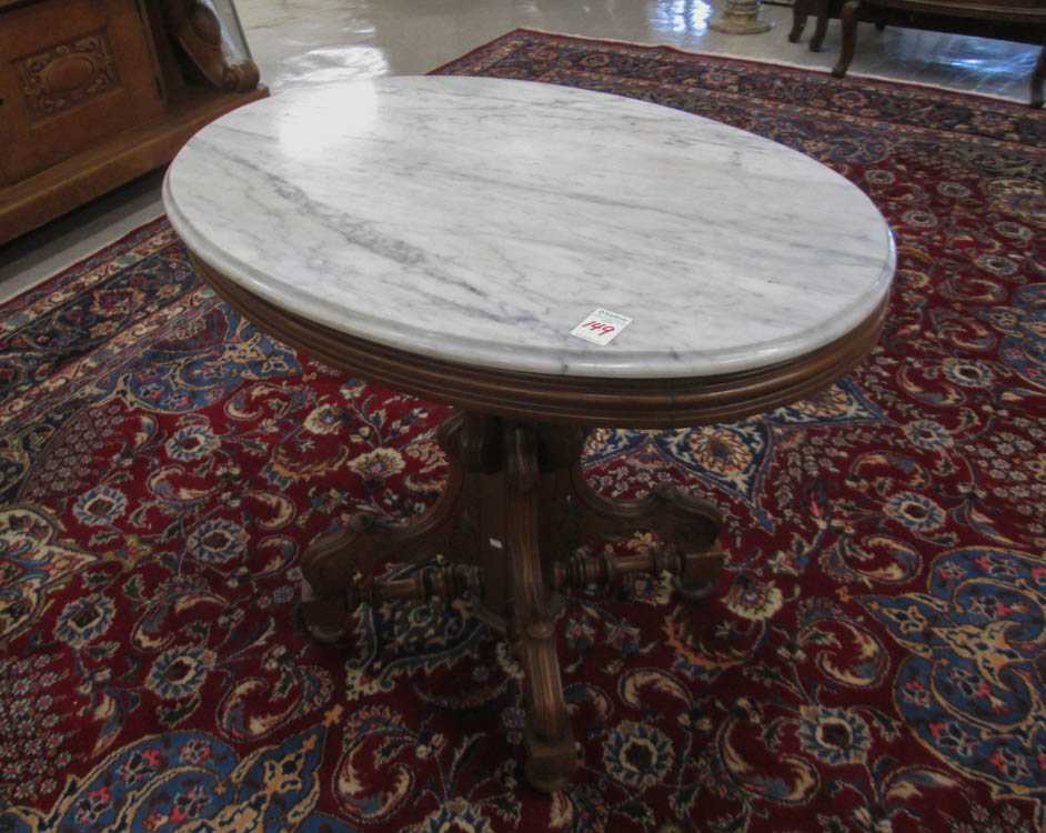 Appraisal: VICTORIAN MARBLE-TOP WALNUT LAMP TABLE American last quarter of the