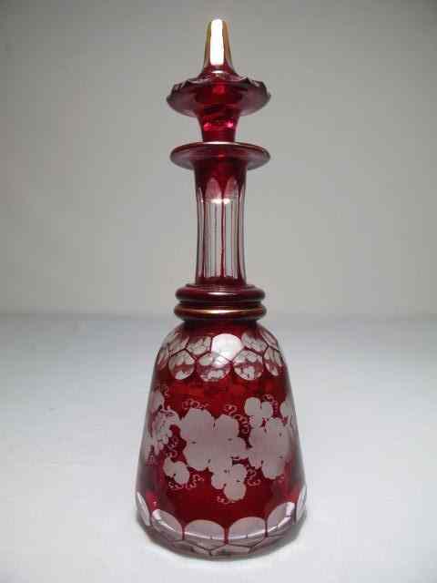 Appraisal: A Bohemian ruby red cut to clear glass decanter with