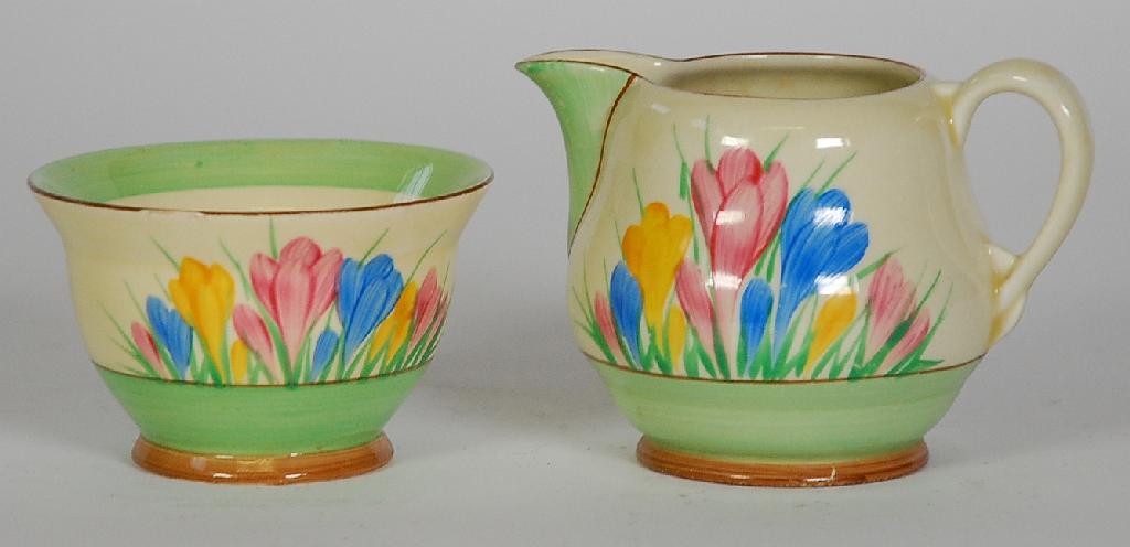 Appraisal: CLARICE CLIFF NEWPORT POTTERY AUTUMN CROCUS PATTERN SUGAR AND CREAM