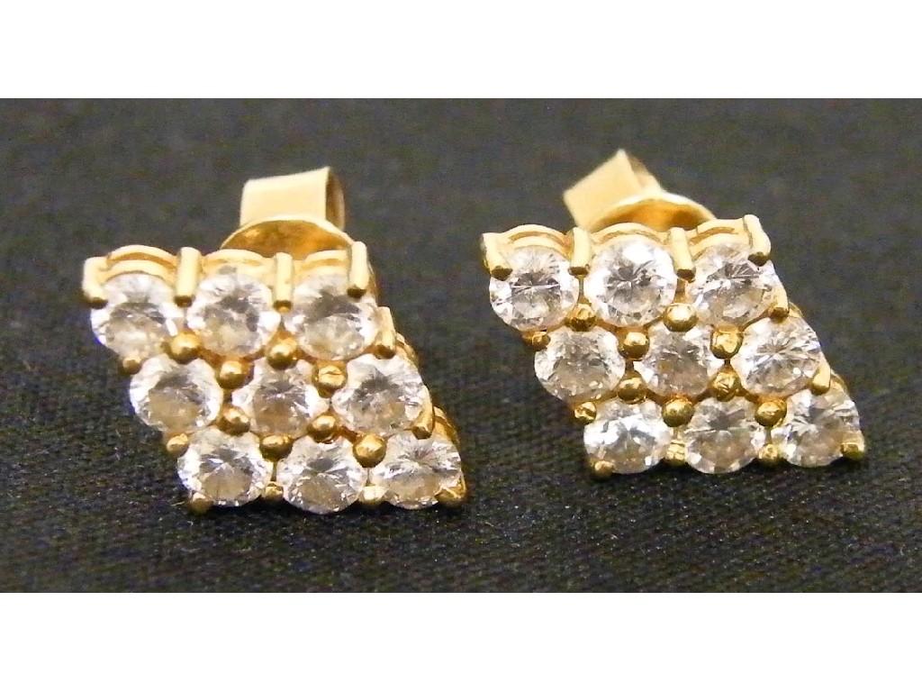 Appraisal: Pair of k diamond lozenge cluster earrings set with nine