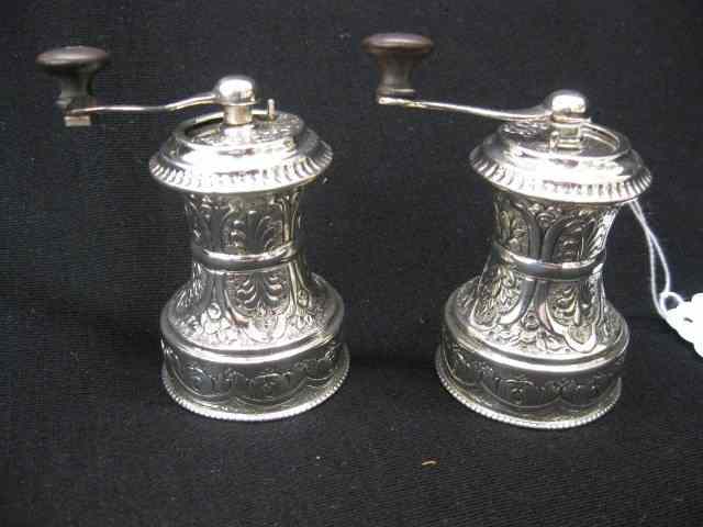 Appraisal: Pair of European Sterling Silver Pepper Mills ornate circa ''