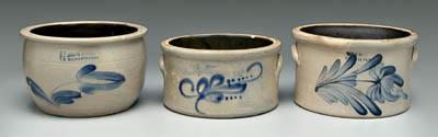 Appraisal: Three salt glaze stoneware crocks all with cobalt floral decoration