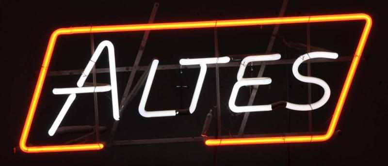 Appraisal: Altes Border Neon Sign Description Red and white neon mounted