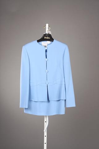 Appraisal: Andr Laug light blue wool skirt suit with faux belt