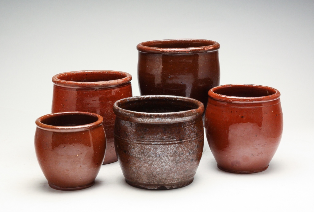 Appraisal: FIVE AMERICAN REDWARE JARS Mid th century Apple butter jars