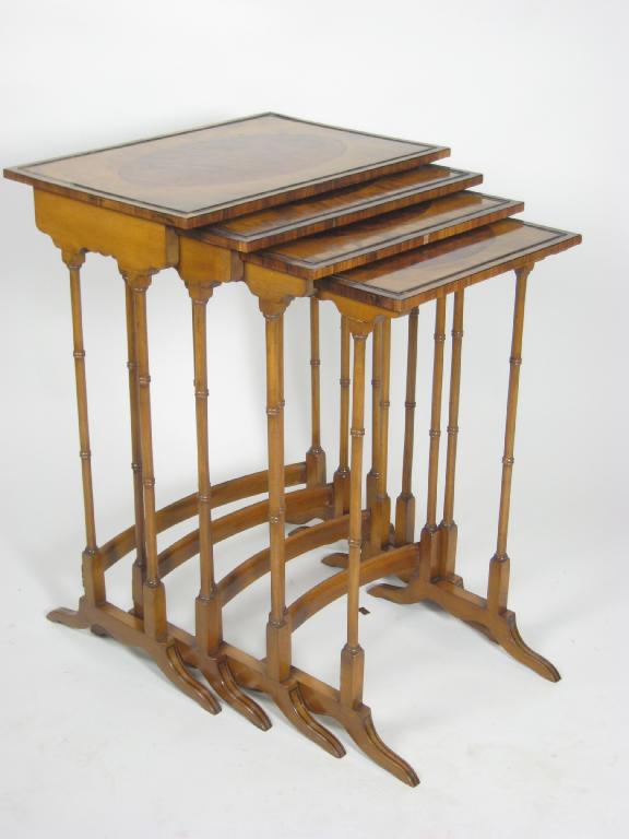 Appraisal: A Quartetto of Occasional Table in mahogany the top crossbanded