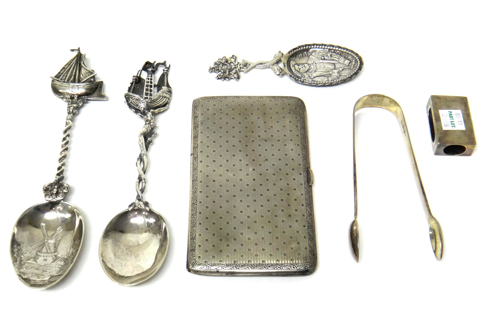 Appraisal: Silver comprising a rectangular cigarette case with engine turned decoration