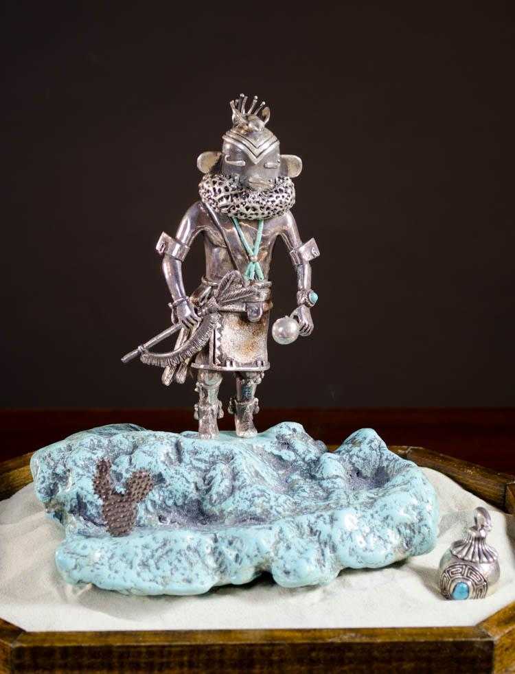 Appraisal: CAROL SUES SILVER AND TURQUOISE SCULPTURE Arizona th century Tocha