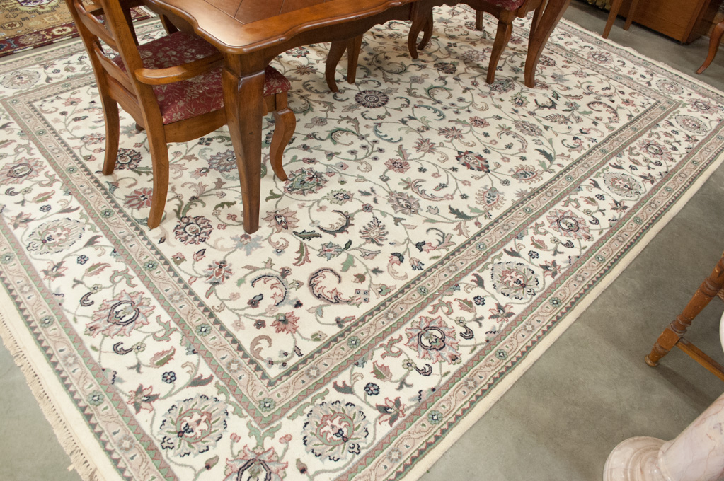 Appraisal: HAND KNOTTED ORIENTAL CARPET Indo-Persian Isfahan floral design on cream