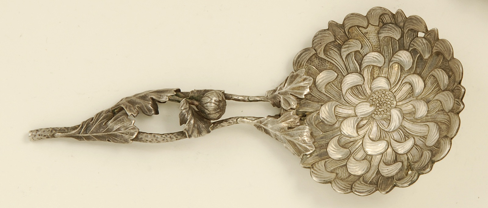 Appraisal: CHINESE EXPORT SILVER SPOON In the form of a chrysanthemum