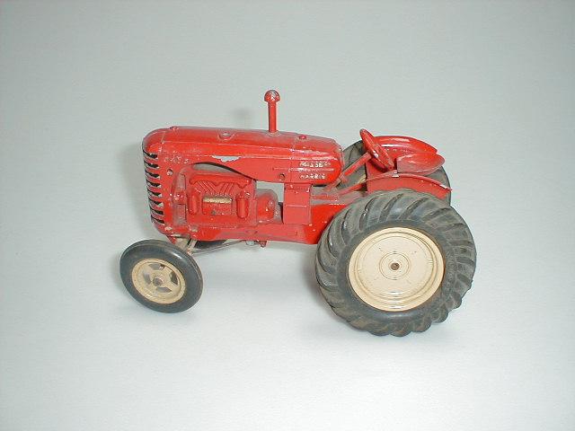 Appraisal: A Lesney Massey Harris tractor with steerable front wheels rubber