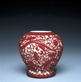 Appraisal: CARVED RED OVERLAY GLASS JAR Superbly and elaborately carved and