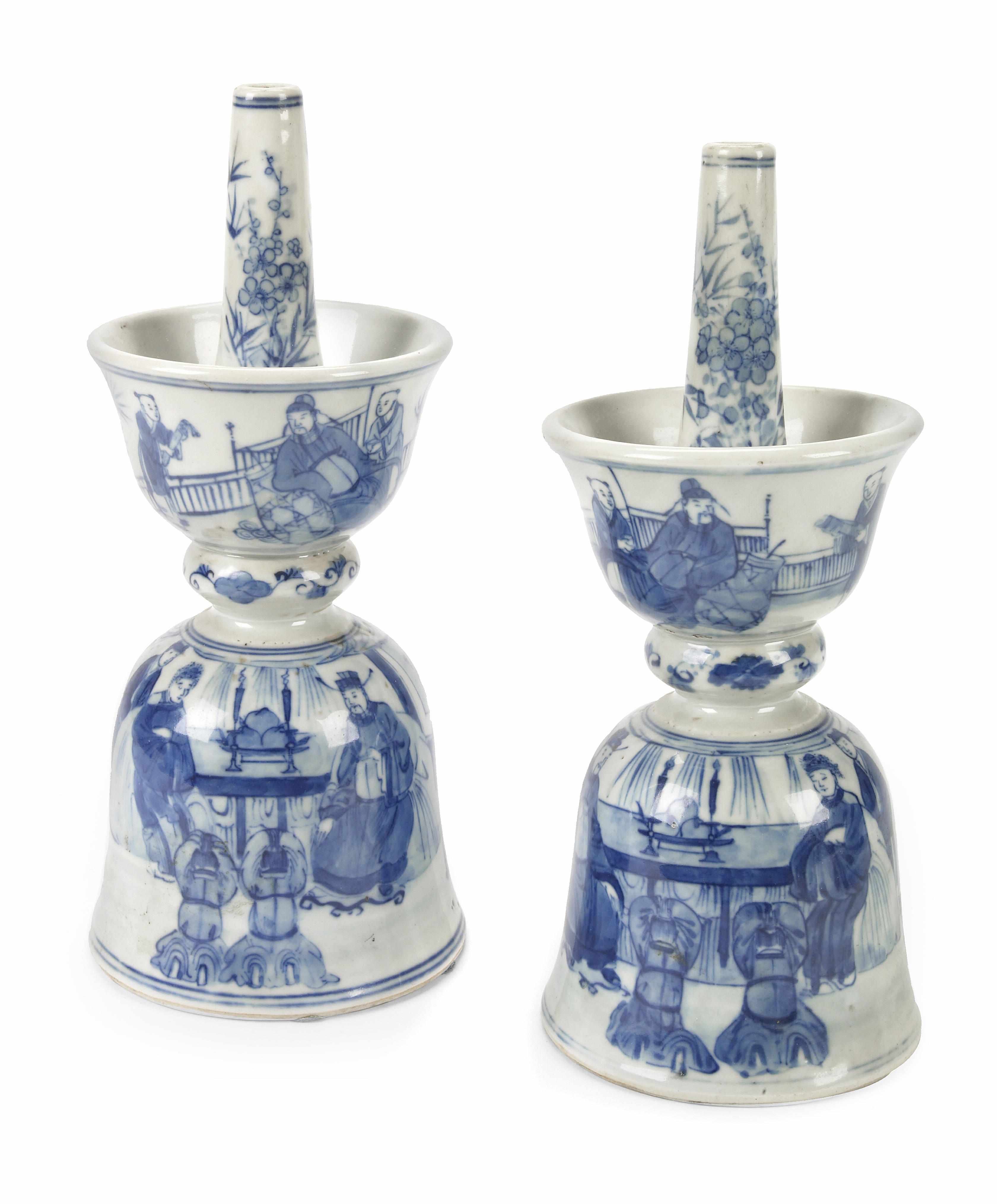 Appraisal: A pair of Chinese blue and white porcelain candle sticks