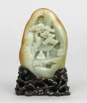 Appraisal: A Carved Jade Boulder with Stand Chinese A smooth jade