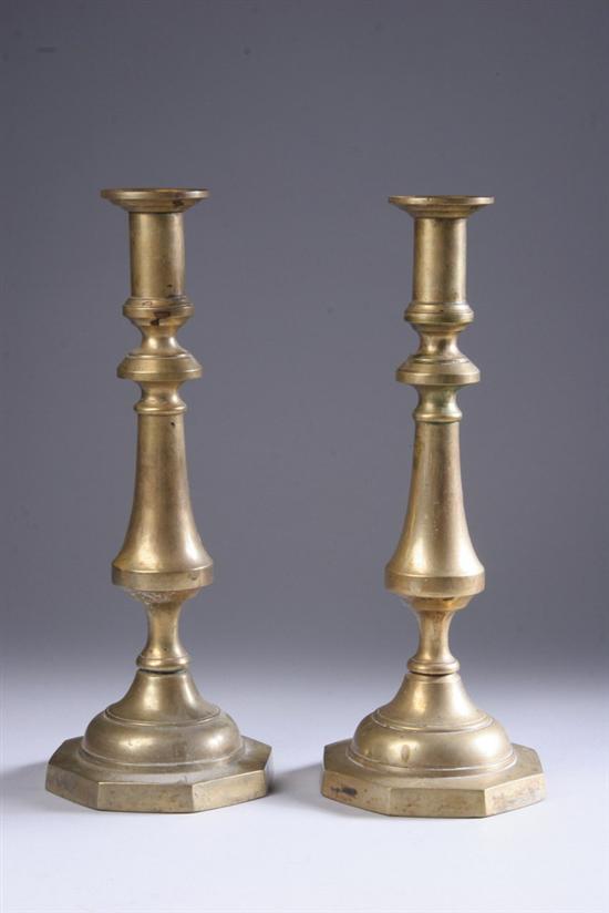 Appraisal: PAIR ENGLISH BRASS CANDLE STICKS th century Baluster-form on octagonal