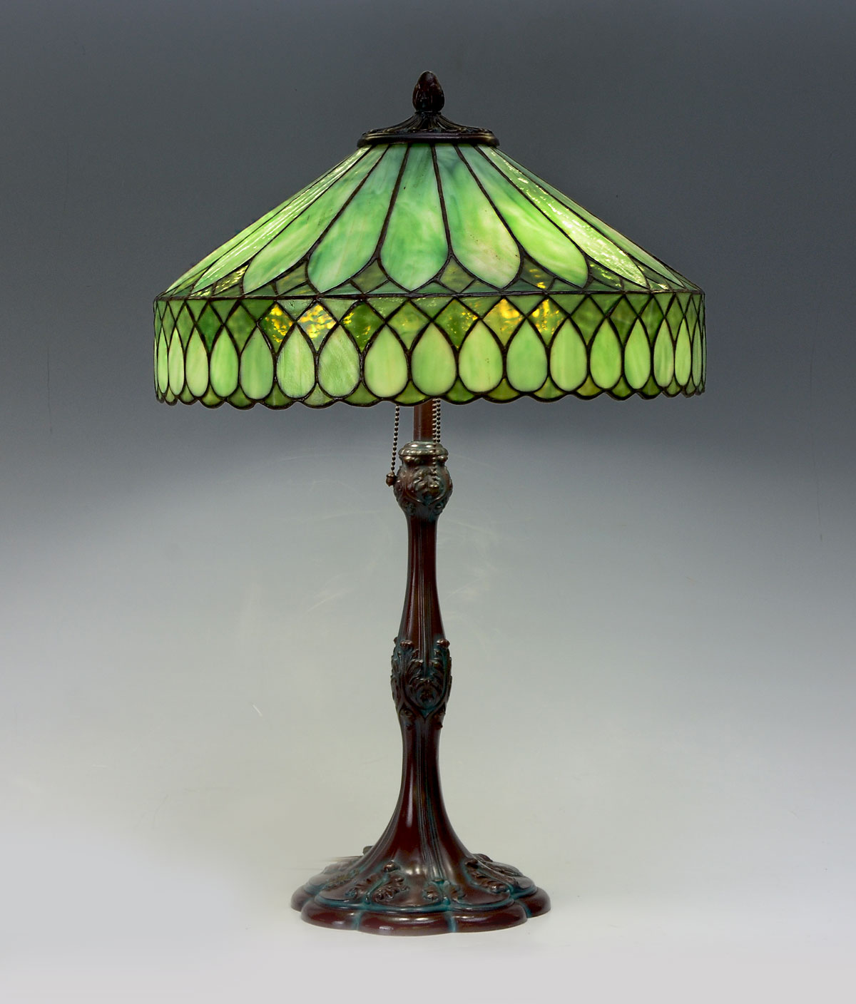 Appraisal: ART DECO STAINED GLASS TABLE LAMP Tiffany quality green stained