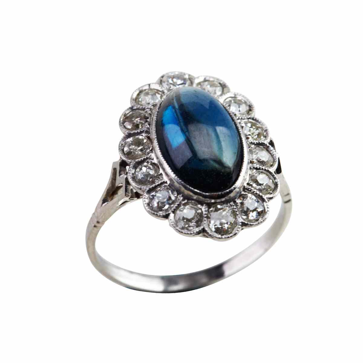 Appraisal: Platinum Ring bezel set with an oval sapphire cabochon mm