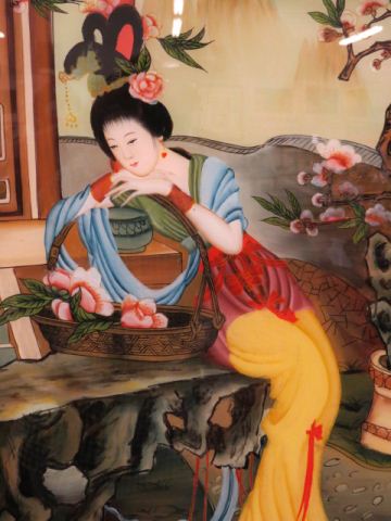 Appraisal: Chinese Reverse Painting on Glass woman with basket of flowers