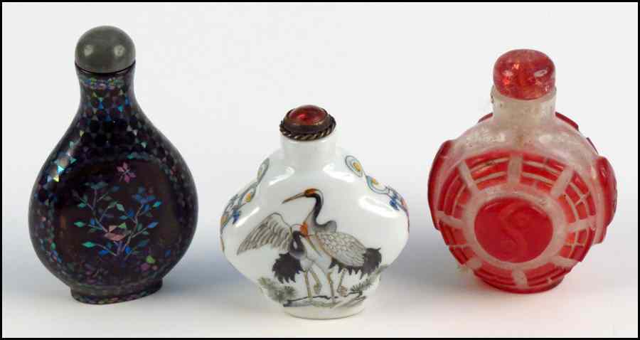 Appraisal: THREE CHINESE SNUFF BOTTLES Porcelain glass and lacquer Condition No