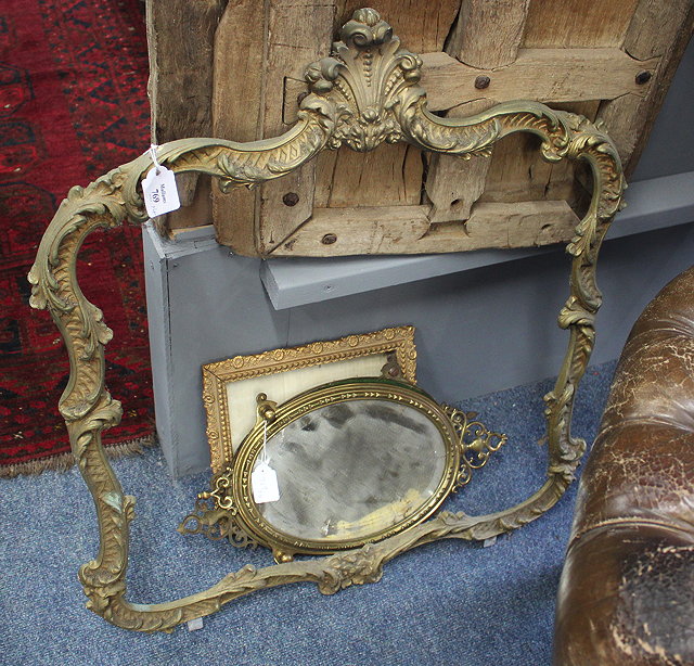 Appraisal: AN EARLY TH CENTURY SCROLLING GILT METAL PICTURE OR MIRROR