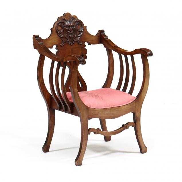 Appraisal: EDWARDIAN MAHOGANY ARMCHAIR Circa shaped crest rail with applied carved