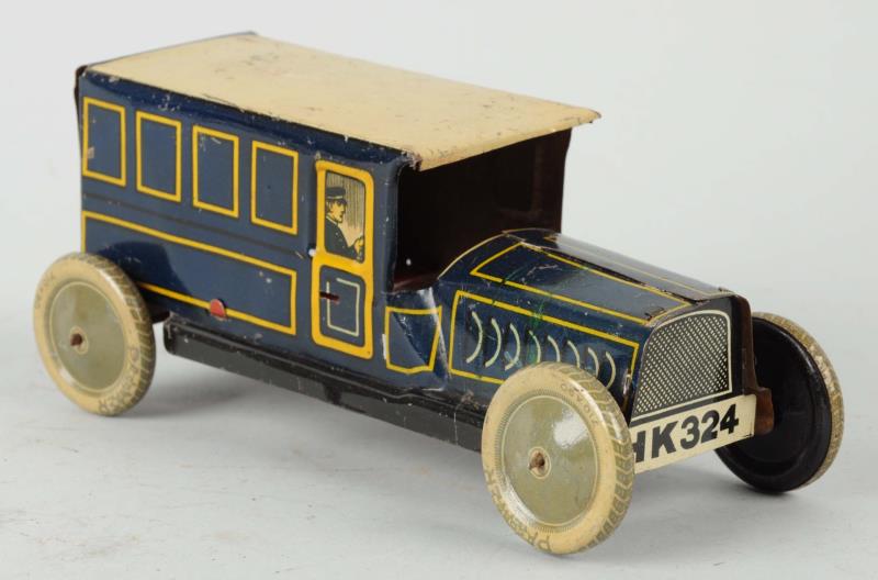 Appraisal: German Tin Litho Wind-Up Bus Has wind up key which