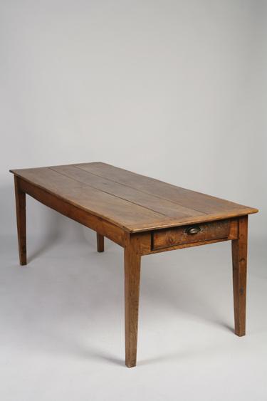 Appraisal: AN ELM FARMHOUSE KITCHEN TABLE with a three plank top