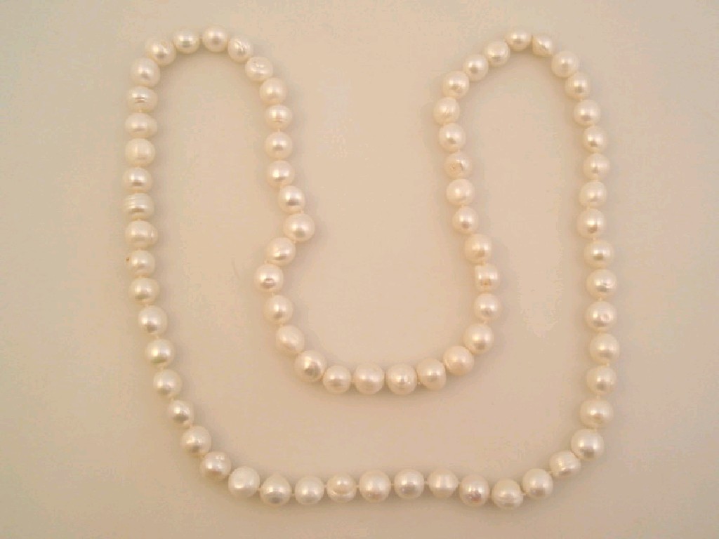 Appraisal: An extra long freshwater pearl white necklace