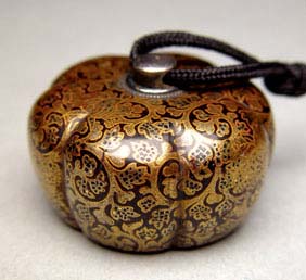 Appraisal: ANTIQUE LACQUER NETSUKE Charming antique carved lacquer netsuke in the