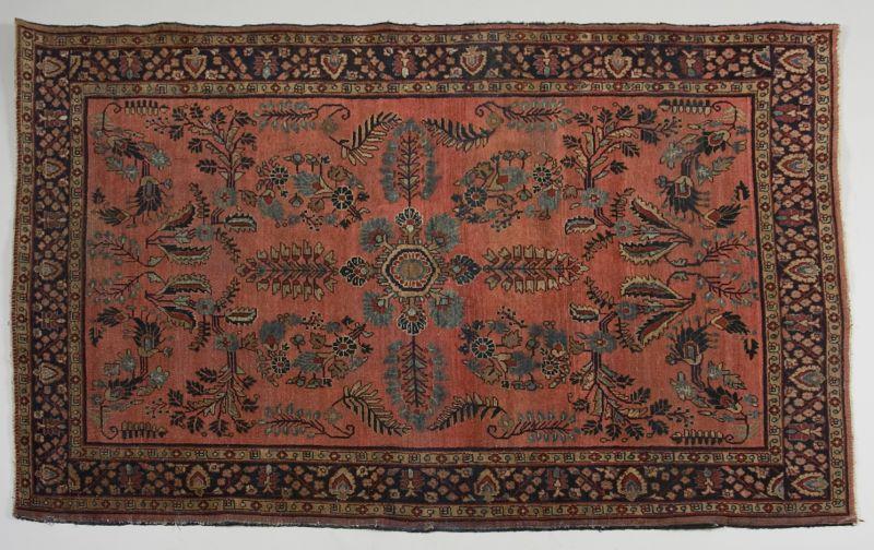 Appraisal: Sarouk Rug ca red field with floral and leaf motif