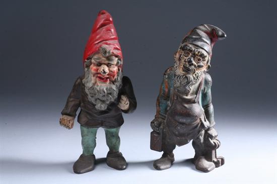 Appraisal: TWO CAST IRON PAINTED GNOME DOORSTOPS One with lantern and