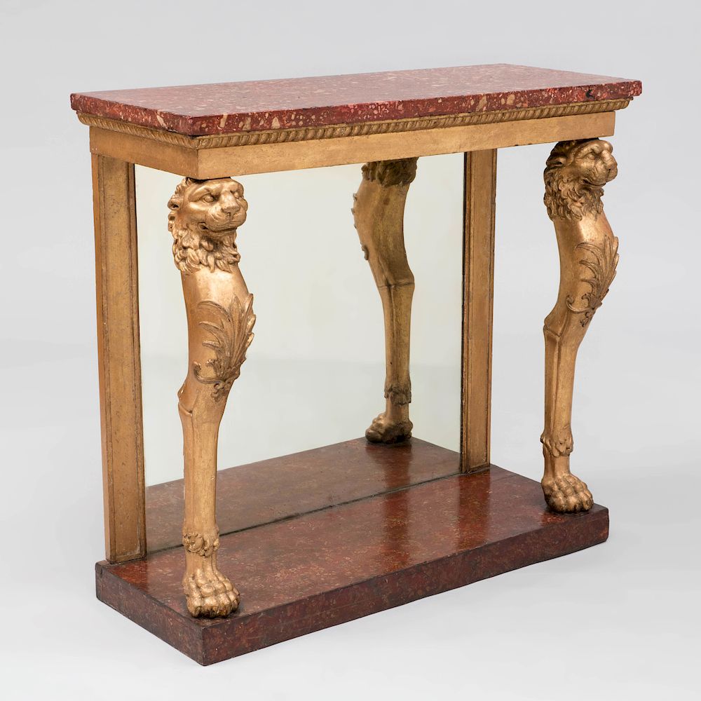 Appraisal: Regency Carved Giltwood Console Table Fitted with a vermilion mottled