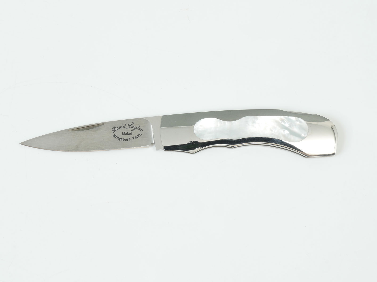 Appraisal: DAVID TAYLOR FOLDER MOP HANDLE Stainless steel lockback folder with