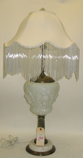 Appraisal: AN AMERICAN MILKGLASS AND BEADED TABLE LAMP having a blown