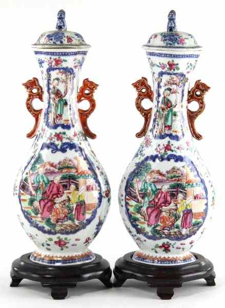 Appraisal: Pair of Chinese Rose Mandarin Lidded Mantle Urnsflattened baluster form