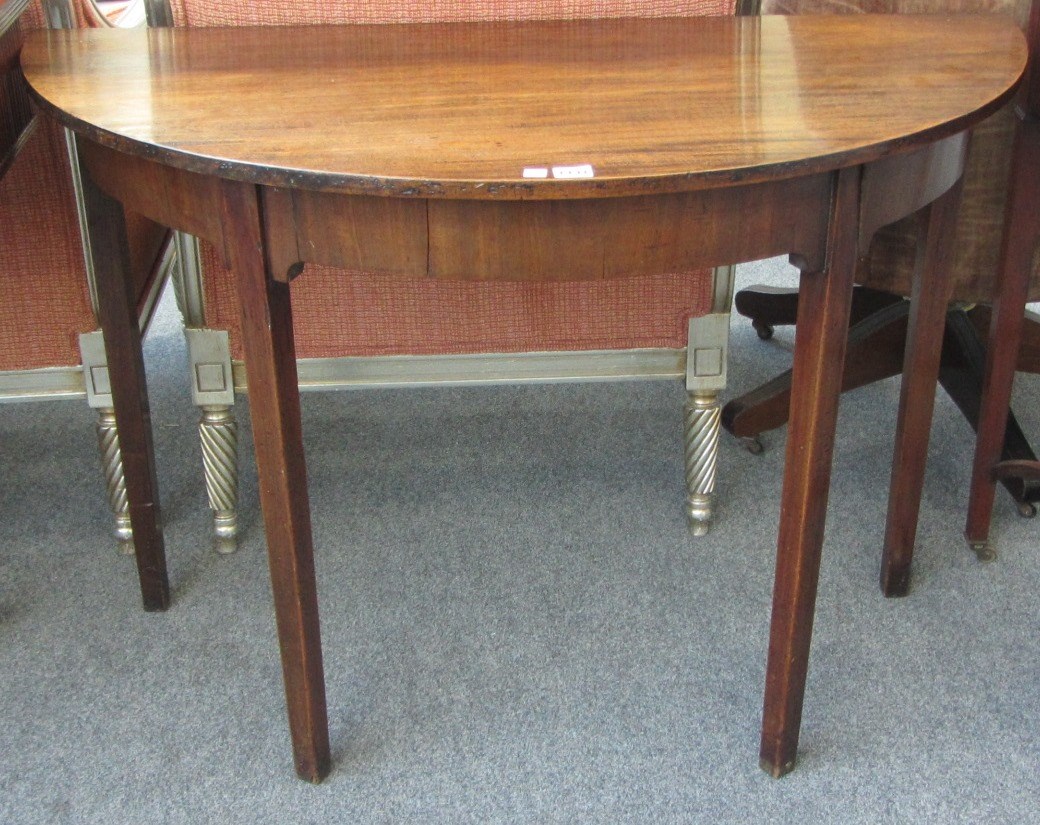 Appraisal: An th century and later mahogany semi-eliptic console table on