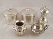 Appraisal: A white metal cup marked and a ribbed spherical vase