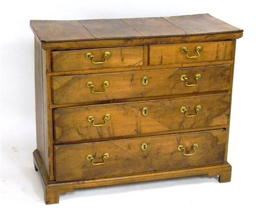 Appraisal: English walnut chest of drawers five graduated drawers two over