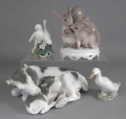 Appraisal: A Royal Copenhagen porcelain group of two squirrels ins high