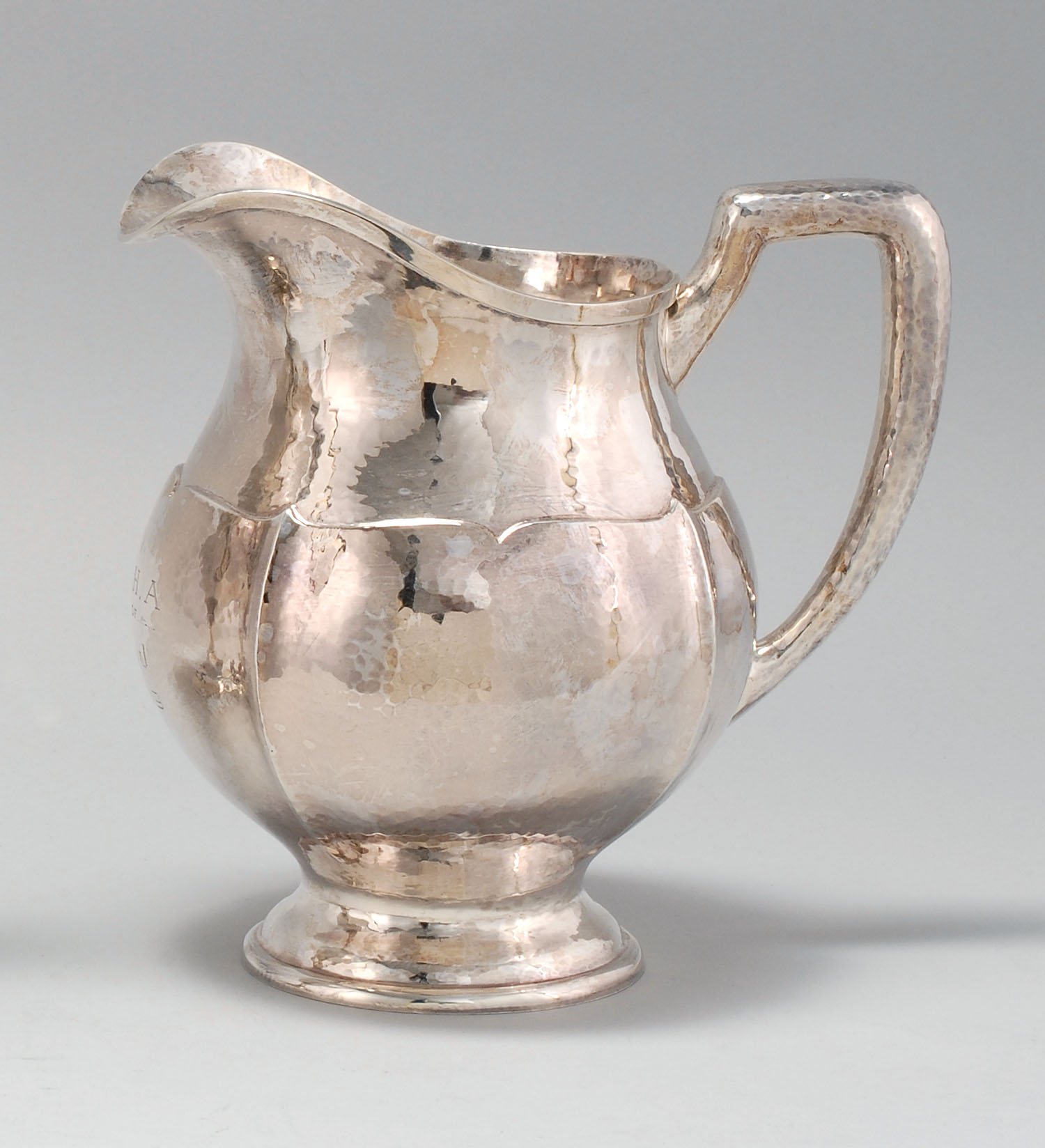 Appraisal: HAND-HAMMERED STERLING SILVER PITCHER Circa By the Merrill Shops of