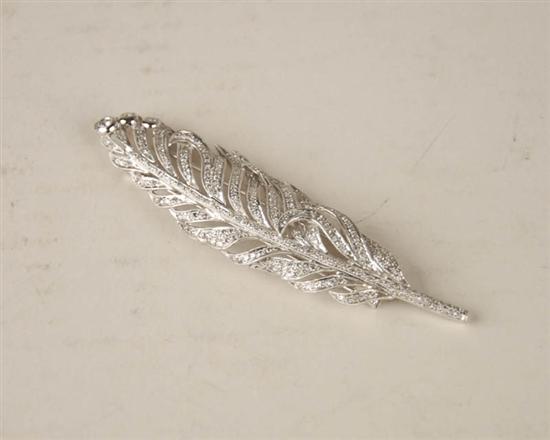 Appraisal: A Platinum and Diamond Feather Brooch marked platinum and set