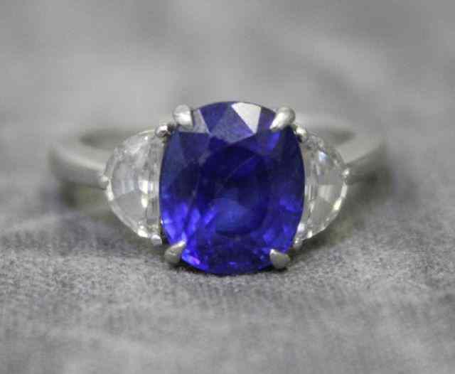 Appraisal: Platinum Diamond and Topaz Ring Faceted oval sapphire - approx