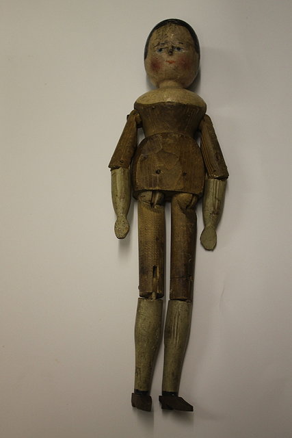 Appraisal: AN TH TH CENTURY CHILD'S WOODEN DOLL with jointed limbs