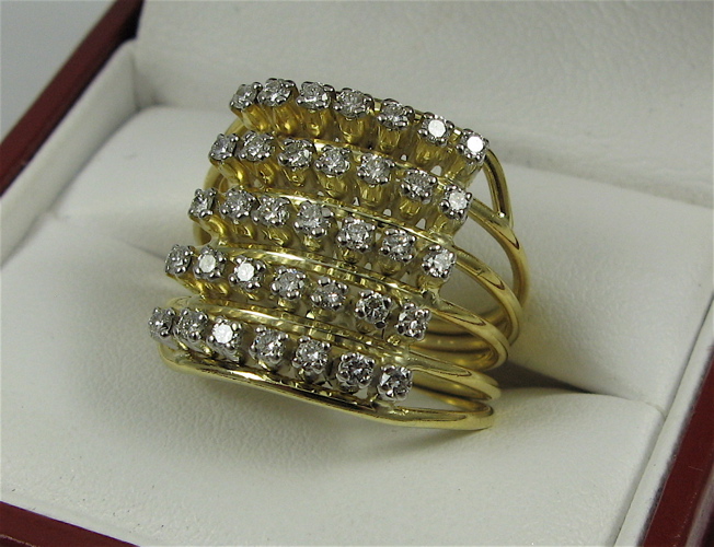 Appraisal: DIAMOND AND K GOLD RING set with round-cut diamond together